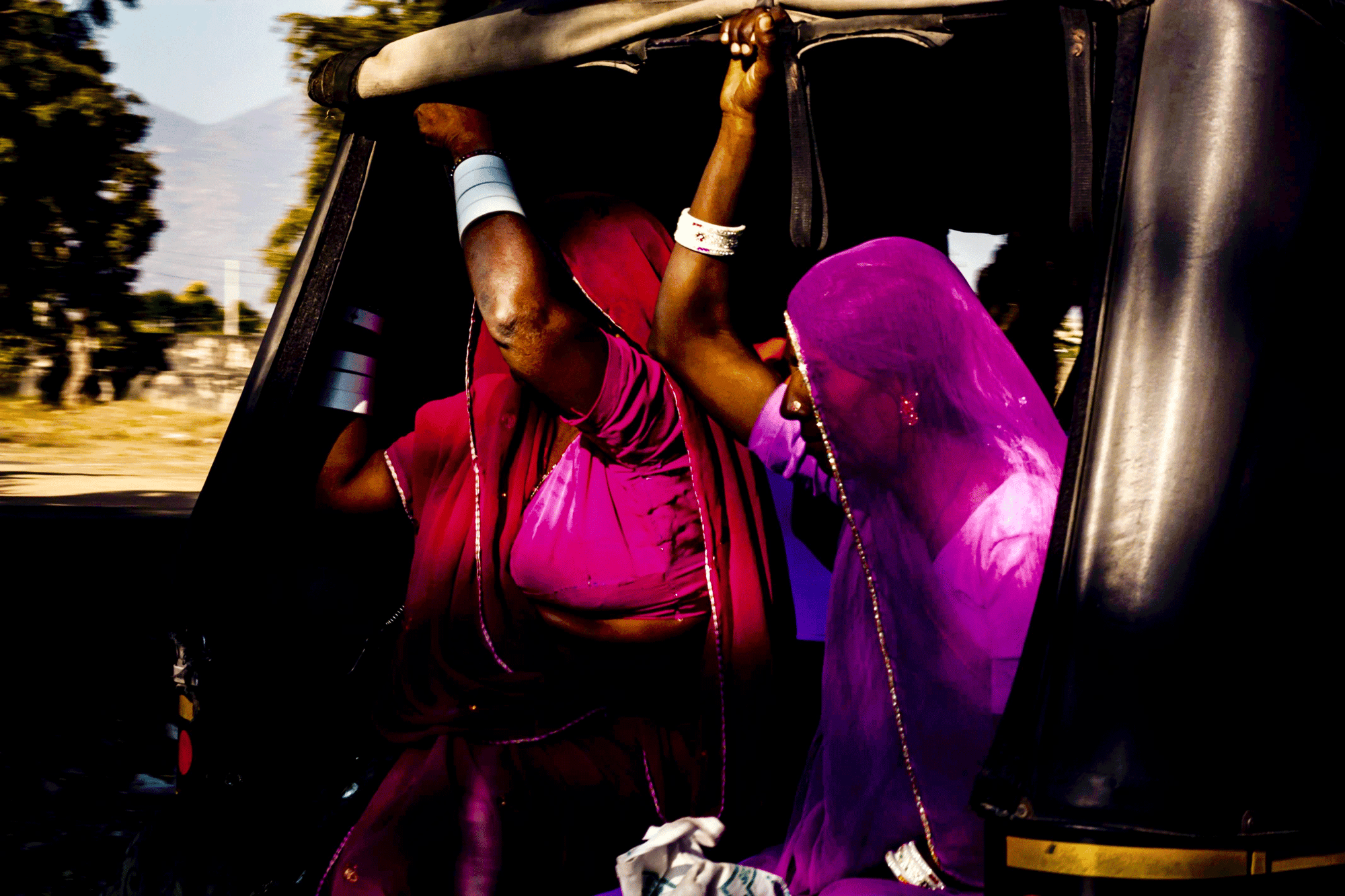 Two-ladies-in-an-auto-rickshaw